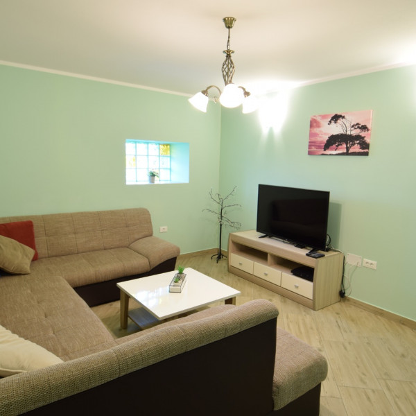 Das Wohnzimmer, HRE119, Ferienhäuser zur Vermietung in Pula Pula
